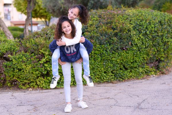 Piggyback,Happy,Friends,With,Gorgeous,Black,Curly,Hair,Having,Fun